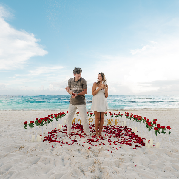 Nothing says 'we're engaged' like a champagne pop!